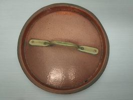 Pentola in rame con coperchio.