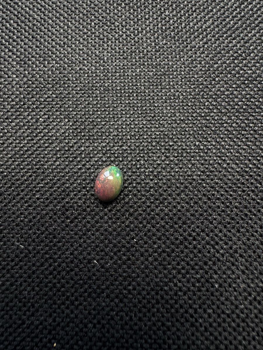 Pierres précieuses: Black Opal AAA 0.75 ct – Neuf avec emballage d'origine à Wängi par Horus90