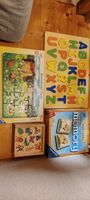 Holzpuzzles und Memories