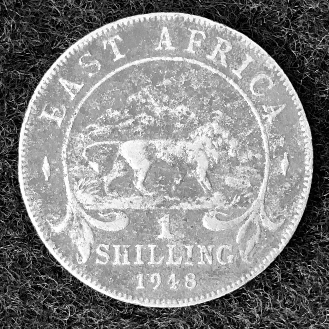 Tutti le monete: 1 Shilling 1948, East Africa – Usato da Röschenz venduto da Sharjah 1