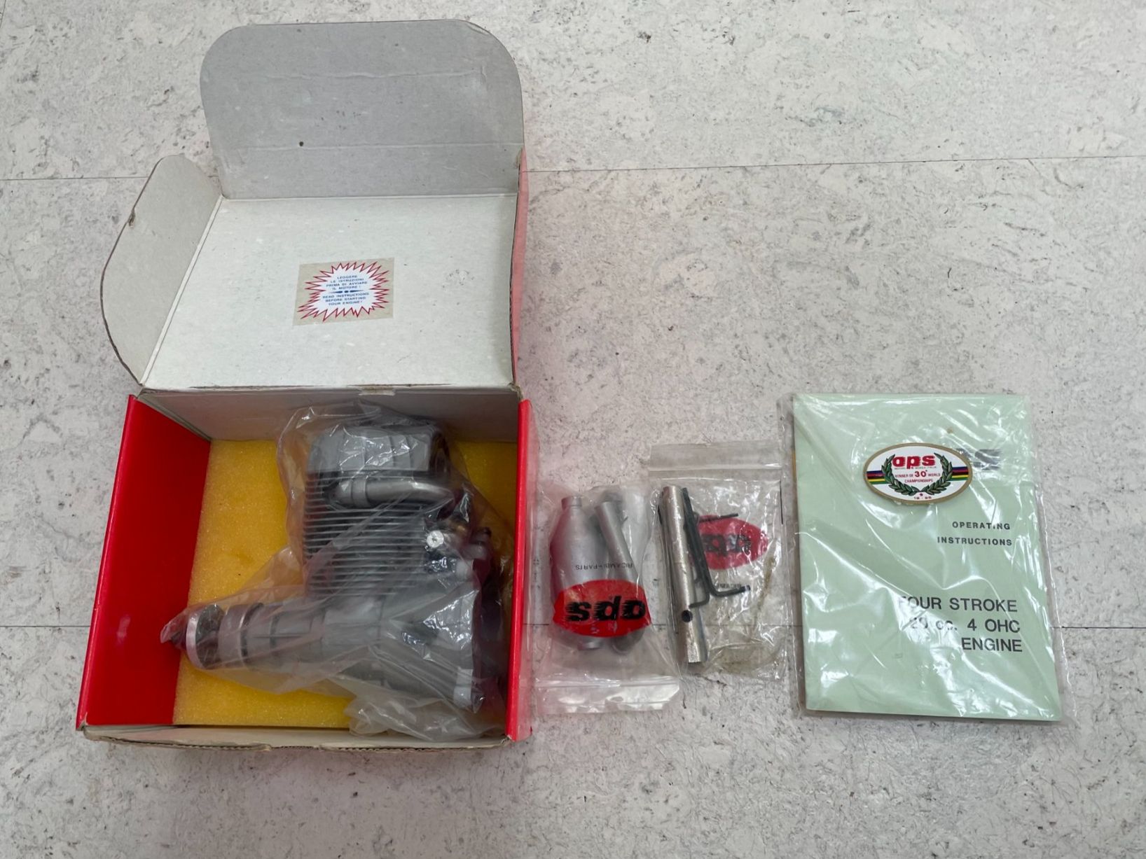 Motoren: Einzigartige Viertakter – OPS 20-40 OHC – Neu und originalverpackt aus Sumiswald von Noudi1