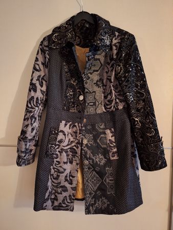 a vendre manteau en bonne état