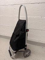 Einkaufstrolley / Einkaufswagen in schwarz, defekt
