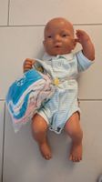 Babypuppe, ca. 45 cm mit Kleidern
