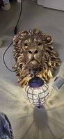 Löwenkopf-Wandlampe