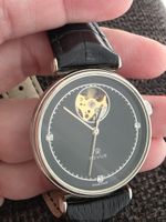 Montre Revue, mouvement apparent squelette, Suisse.