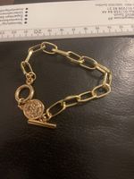 Bracelet à maillons dorés avec breloque.unisexe neuve 18 cm 