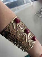 Armreif goldfarben mit roten Steinen guter Zustand