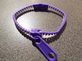 Armband Reissver. violett/weiss (Nr.1)