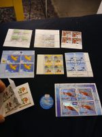 Collection de timbres suisses variés + médaille olympique