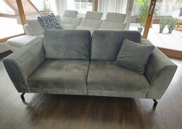 Moosgrünes Sofa