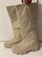Neuwertige gefütterte Stiefel, Gr. 40