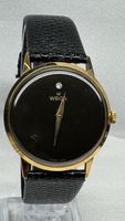 Vintage Wega Armbanduhr goldfarben schwarzes Zifferblatt