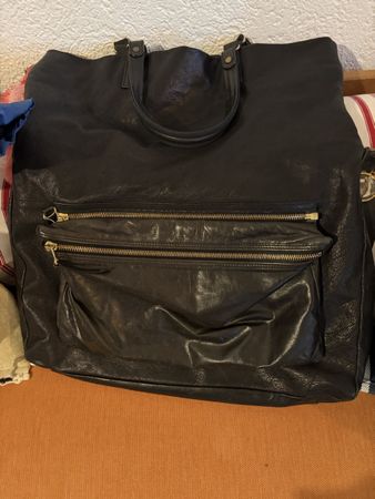 Sac cuir pleine peau grand peu être plus petit se replie