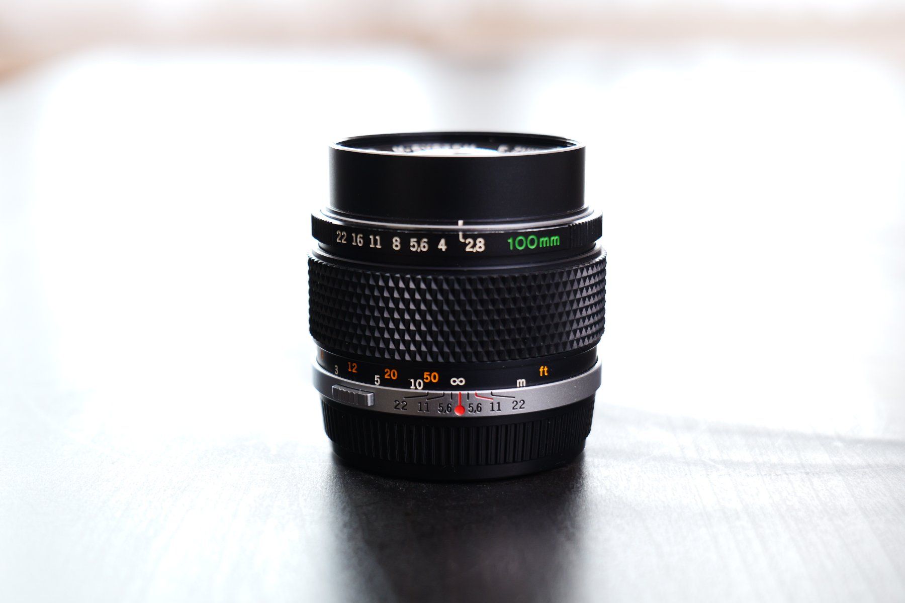 Olympus Objectifs: Olympus OM Zuiko 100mm f2.8 – D'occasion à Tecknau par LevinLaufmann 1