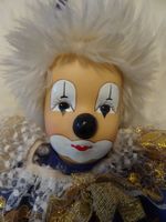 Clownpuppe mit Porzellangesicht