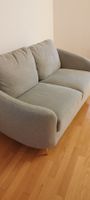Hellgraues Sofa