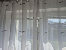 Vörhang mit Gleiter