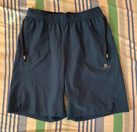 Short de sport Domyos bleu ? Taille S/M