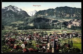 AK Meyringen, Ortsansicht mit Kirche und Alpenkulisse