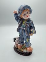 Figur Junge mit Steinschleuder und Hund