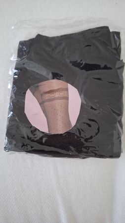 Neu! Schwarze Strumpfhose mit Punktmuster.