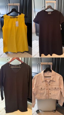 Ein Set von Kleidungsstücken, von einem Kleid bis zu Jeans