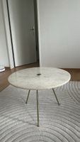 Elegant coffee table with gold legs