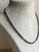 Hämatit Kette mit goldenen Akzenten (Silberverschluss)