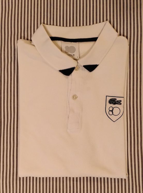 Polo lacoste outlet taille xs