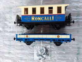 1wagon voy. + 1wagon plat Roncalli Piko G.