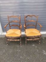Paire de fauteuils en bois noirci