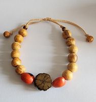 Palo Santo Holz Armband mit Huayruro Glücksbringer Samen.