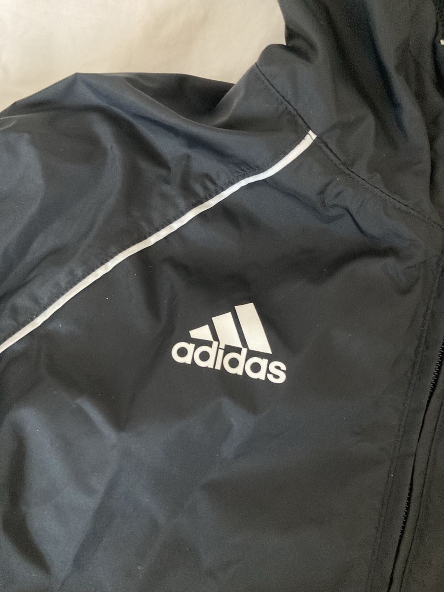 Adidas Giacche & Cappotti: Adidas kids light rain jacket  – Usato da Bottmingen venduto da Poppyfields 1