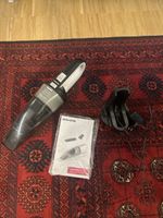 Handheld vacuum cleaner Mio Star with station and manual