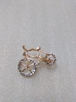 MODESCHMUCK BROSCHE;EIN VELO;VERGOLDET