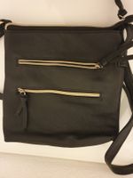 Sac à bandoulière noir, parfait pour toutes les saisons!