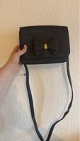 Elegante schwarze Umhängetasche