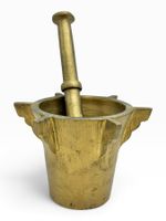 Ensemble d'apothicaire mortier et pilon à ailettes en bronze