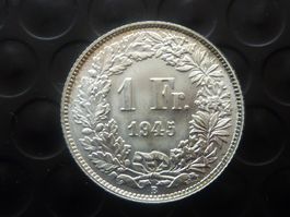 1 Fr. 1945  Unz. / Stgl.  + Ungereinigt.