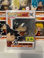 Funko Goku driving exam comic con
