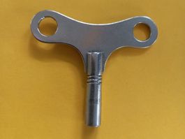 Clef papillon pour horloge ancienne