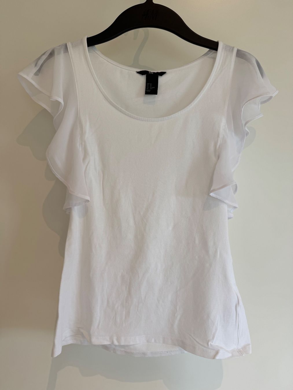 H&M T-shirt: T-Shirt à volant - H&M – Usato da Denens venduto da sar_5wlm