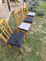 4 chaises de salle à manger bleu avec coussins noirs et gris