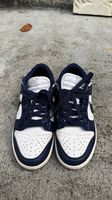 Nike Dunk Low in navy blue and white