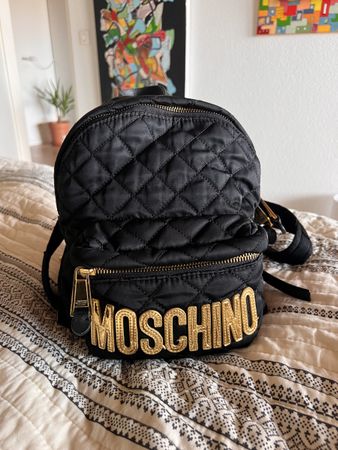 Moschino Rucksack schwarz gold