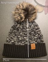 Strickmütze mit Bommel schwarz grau gebraucht