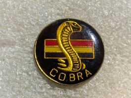 Ansteckpin 60: Cobra