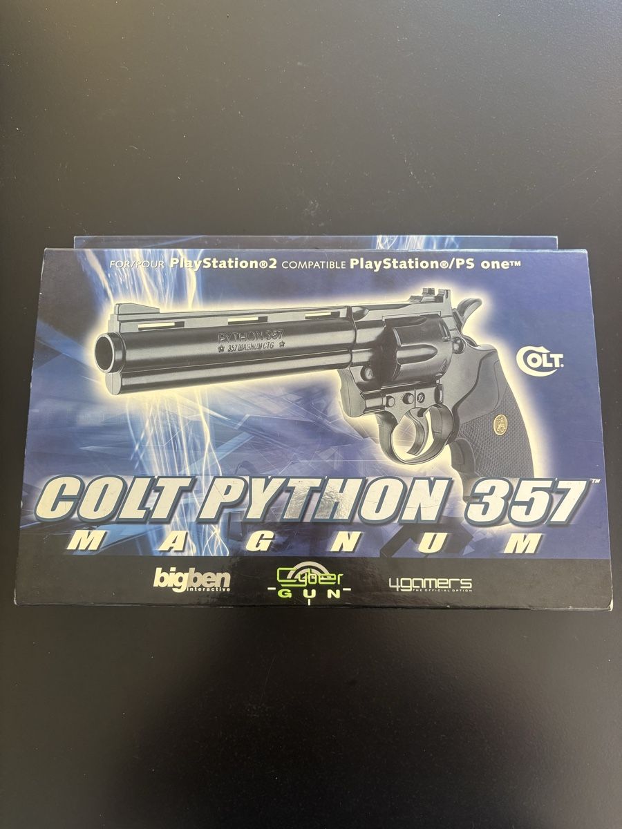 Manettes: Lightgun Colt Python 357 Magnum PS2 PS1 BigBen Neu – Neuf avec emballage d'origine à Volketswil par 1970rog 1