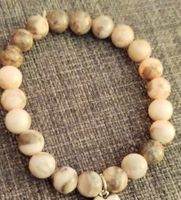 Armband mit Perlen beige/grau neu